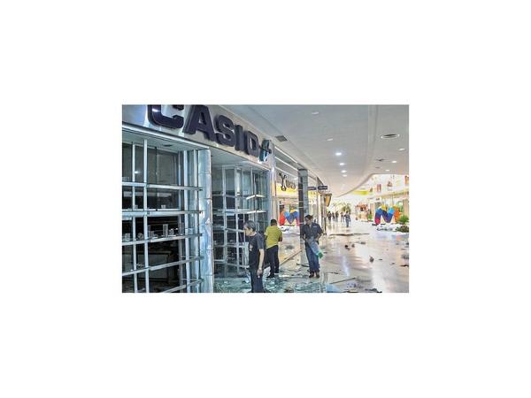 La venezolana Maracaibo sufre cortes de luz y saqueos