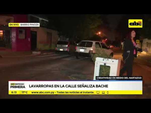 Lavarropas en la calle señaliza bache - Tv - ABC Color