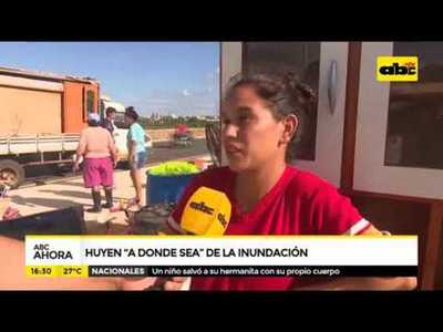 Ribereños huyen “a donde sea” de la inundación - Tv - ABC Color