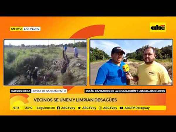 Vecinos se unen y limpian desagüe - Tv - ABC Color