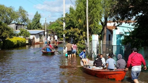 Hallan cadáver de un joven  desaparecido en una zona  de viviendas inundadas | Paraguay en Noticias 