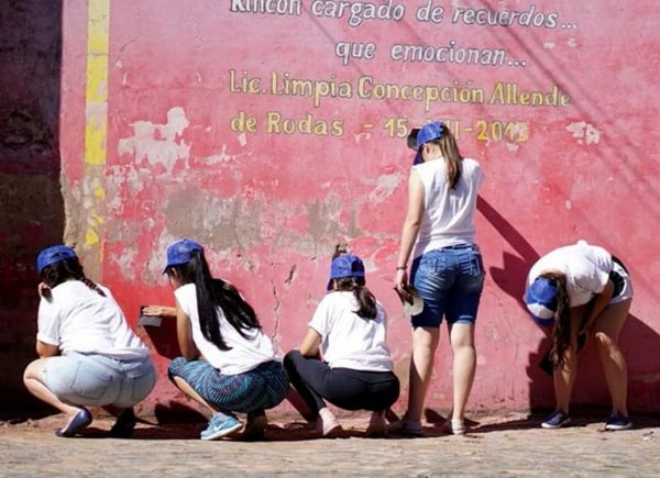 Voluntarios pintan el barrio San Jerónimo - Edicion Impresa - ABC Color