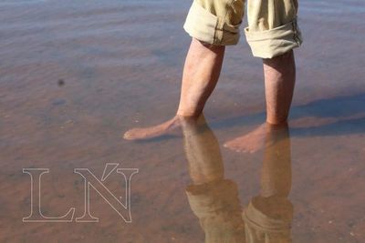 Vecinos de Ypacaraí son preparados ante posible inundación