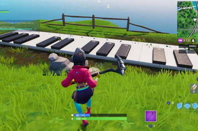 Fortnite Semana 2, Temporada 9 : Visita un teléfono, un piano y un trofeo de pez bailarín
