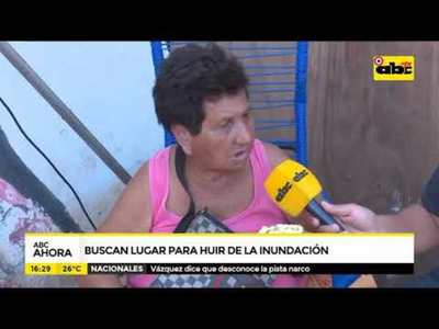 Buscan lugar para huir de inundación - Tv - ABC Color
