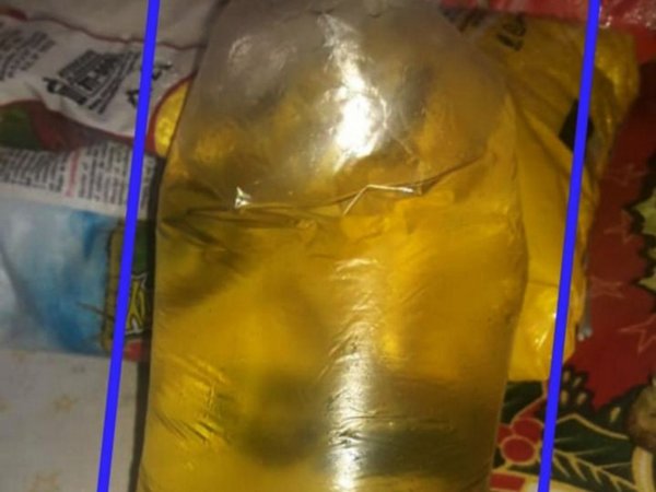 Entregan aceite en bolsitas a padres para elaborar el almuerzo escolar