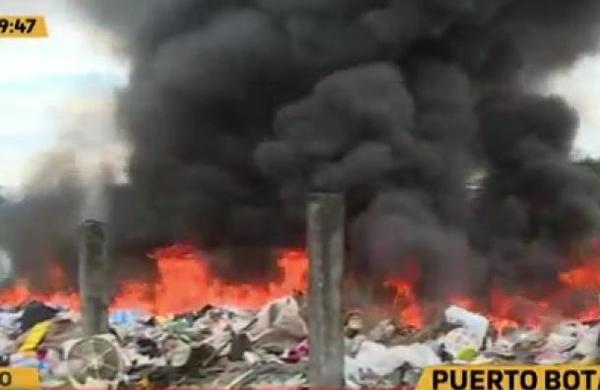 Peligrosa quema de basura en Puerto Botánico - C9N