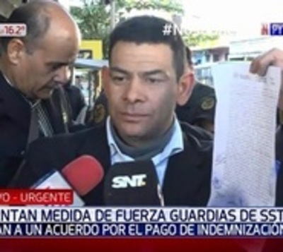 Guardias despedidos llegan a acuerdo y levantan protesta - Paraguay.com