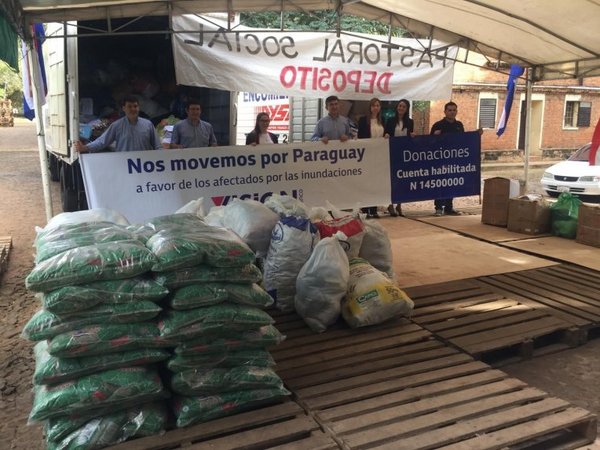 Visión Banco entregó aporte a afectados por las inundaciones - Empresariales - ABC Color