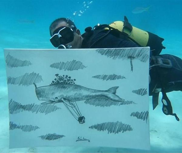 Artista cubano sorprende pintando bajo el mar