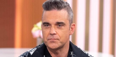 HOY / Robbie Williams gasta dineral  por guardaespaldas que lo  protejan de los extraterrestres