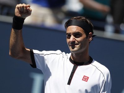 Federer arrolla al británico Evans y pasa a cuarta ronda
