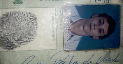 Encuentran a rapai muerto entre rosarios