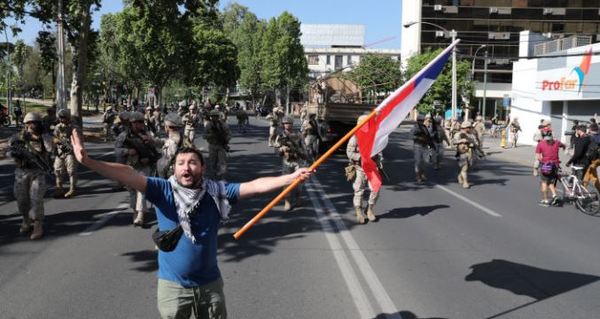 Los chilenos marchan por sus derechos en una ciudad militarizada - .::RADIO NACIONAL::.
