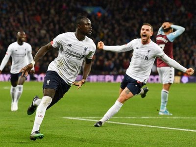 Un épico Liverpool remonta en cinco minutos para mantener a raya al City