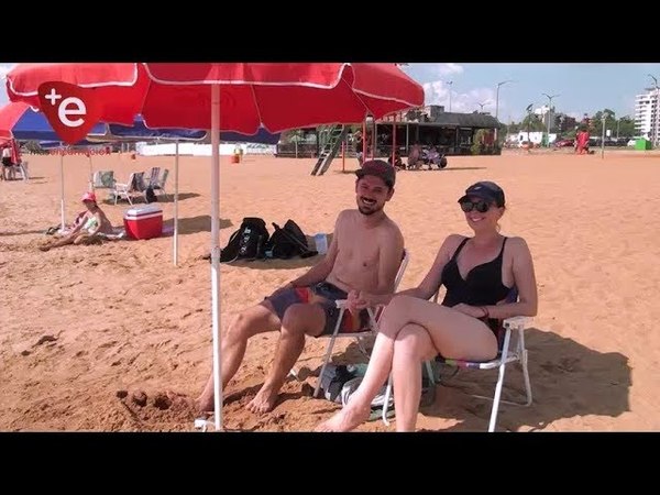 TURISTAS ENAMORADOS DE LA PLAYA SAN JOSÉ