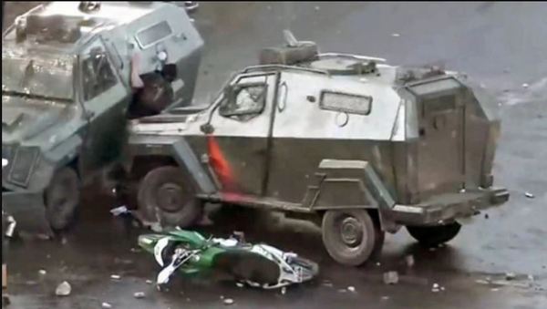 Funcionario de la Policía chilena fue imputado por atropellar a un manifestante » Ñanduti