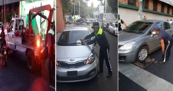 Agentes multan a conductores y llevan con grúa coches mal estacionados frente al Cristo Rey