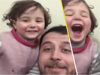 Al estilo La Vida es Bella: Padre hace reír a su hija durante guerra en Siria