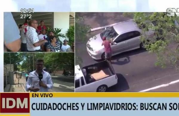 Buscan soluciones para la problemática de cuidacoches y limpiavidrios - SNT