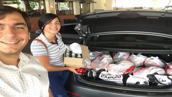 Voluntarios entregan alimentos a recicladores con vulnerabilidad