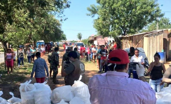 HOY / Primera Dama y militares distribuyen almuerzo a varios barrios capitalinos