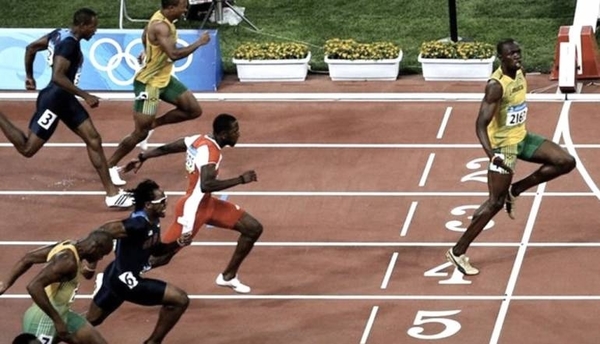 HOY / Bolt ilustra el distanciamiento social con la foto de su victoria en Pekín 2008