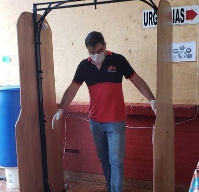 Jóvenes crean portal de desinfección en Minga Guazú