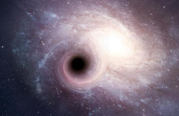 Hallan un agujero negro 'ultramasivo' que devora la masa del Sol a diario - C9N