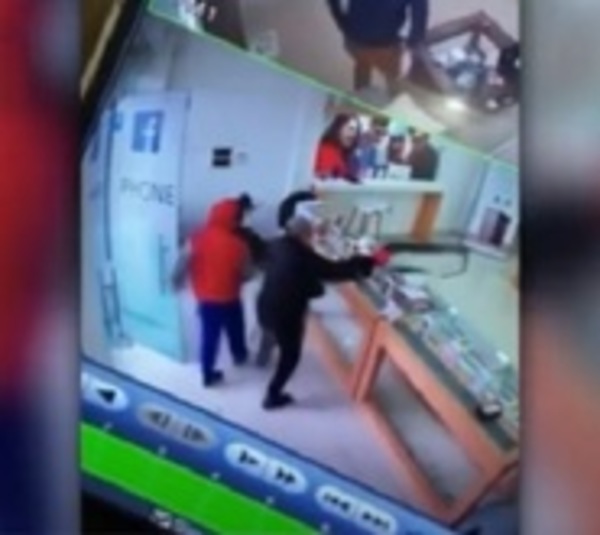 Violento asalto a local de ventas de celulares - Paraguay.com