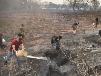 Arde  el país y el  Gobierno sin logística    pide ayuda   internacional