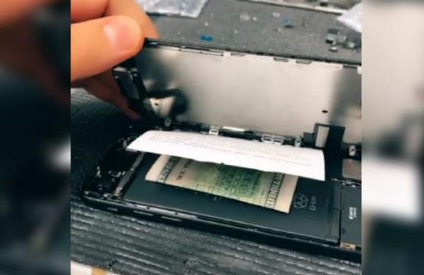 Abrió un iPhone para repararlo y encontró una nota con un soborno: 'Dile a mi esposa que no se puede arreglar' - C9N