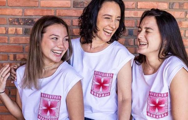 Reclusas trabajan con empresa paraguaya en realización de remeras contra cáncer de mamas
