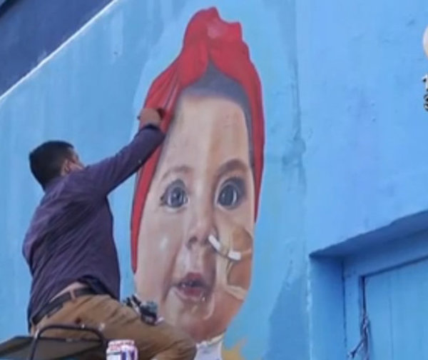 Pintan el rostro de la niña Bianca en murales de Caacupé