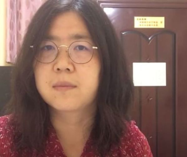 Condenan a prisión a periodista que informó sobre Covid desde Wuhan