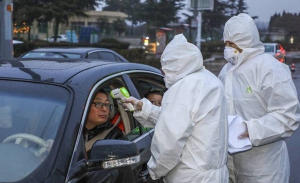 HOY / OMS llega a China para estudiar origen del virus, mientras se dispara el contagio