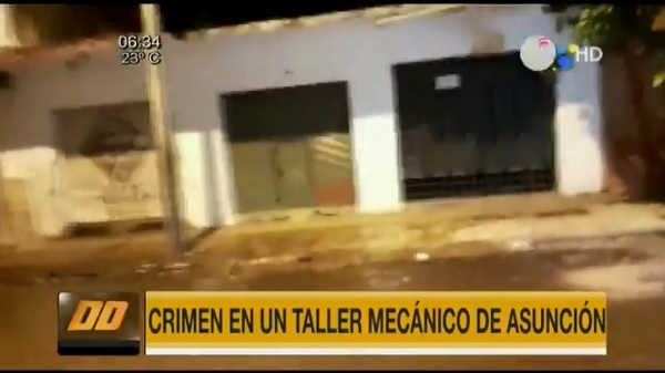 Investigan asesinato de joven en un taller mecánico