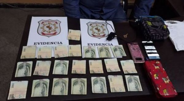 Policías habrían pedido G. 50 millones a mujer que era buscada por estafa