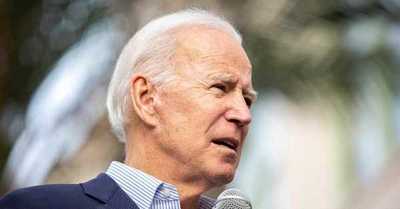 Biden calificó de “pensamiento neandertal” la decisión de eliminar el uso obligatorio de la mascarilla - C9N
