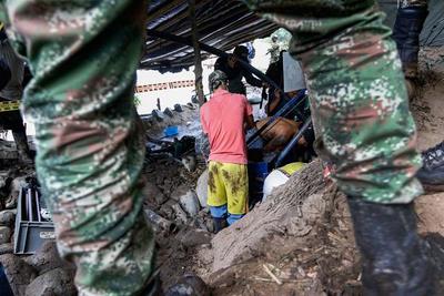 Tras 24 días rescatan cuerpos de 11 mineros atrapados en socavón en Colombia - MarketData
