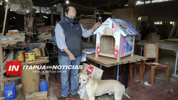 DE PROPAGANDA RETIRADA CONSTRUYEN CASAS PARA PERROS.