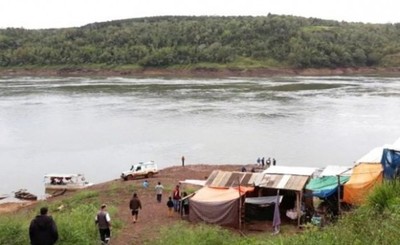 Joven que cruzaba el Paraná es ultimado de un disparo en la cabeza