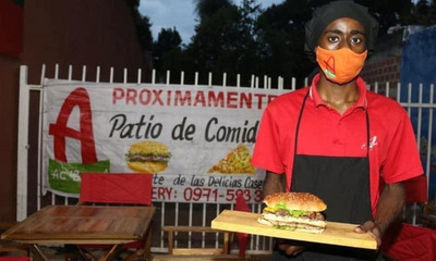 Joven angoleño vende hamburguesa afroguaraní - OviedoPress