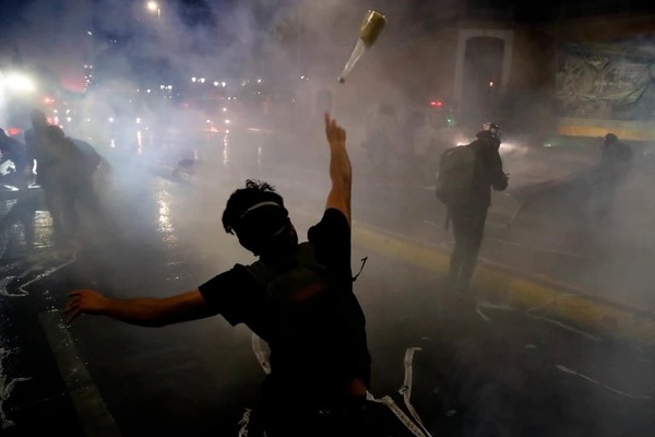 Chile: dos muertos y 450 detenidos en marcha por aniversario de protestas - ADN Digital