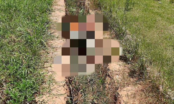 Hallan un cadáver dentro de una canaleta en el barrio Azucena - Noticiero Paraguay