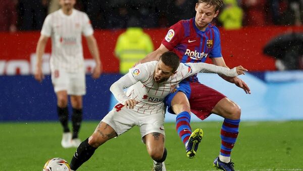 Sevilla y Barcelona firman empate con sabor a poco