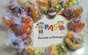 PAS llega a familias con cena de navidad