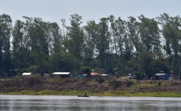 Con avance de obra, más invasores llegan a zona de futuro puente Héroes del Chaco - Nacionales - ABC Color