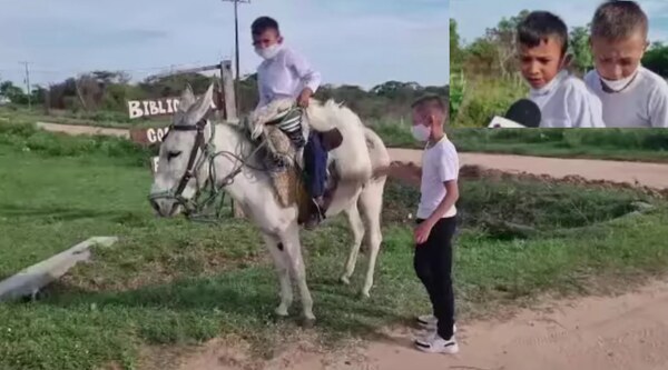 Niños van a la escuela sobre un burro - Noticiero Paraguay
