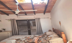 ¡Miedazo! Construcción de edificio reventó casa de un abuelo, le llueven materiales de una obra de 22 pisos - OviedoPress